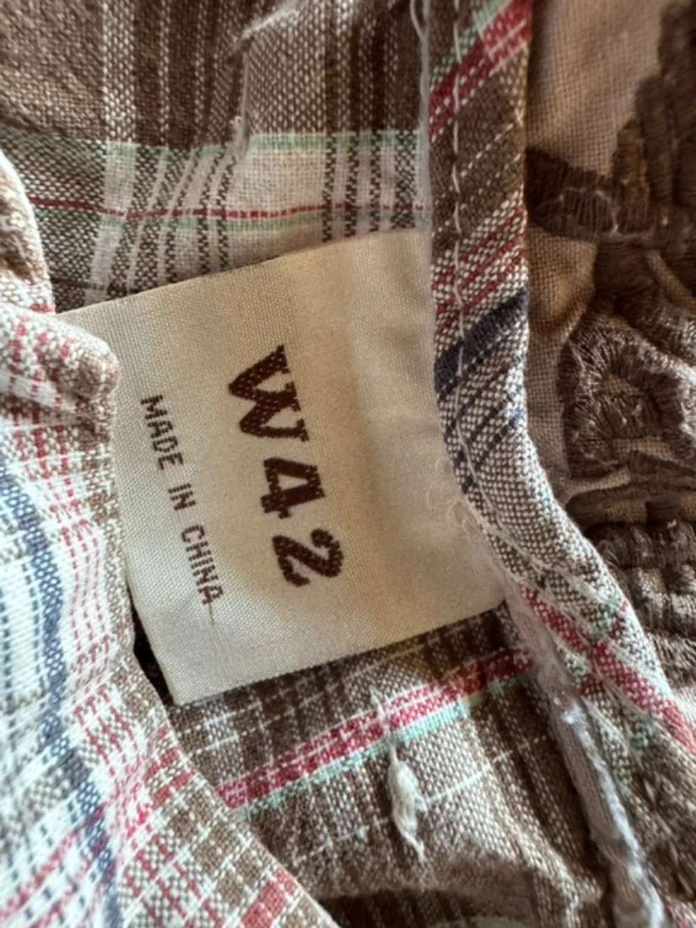 Brown plaid shorts, size 42